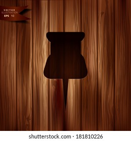 Pushpin web icon. Wooden background.