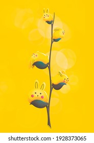 Pussy-willow plant with cute easter rabbits for postcards or printing