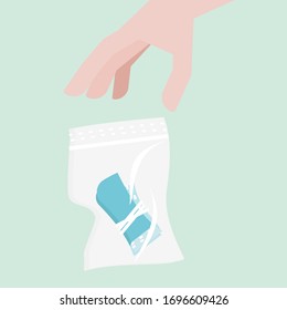Put the mask in a plastic bag. Before throwing away the trash