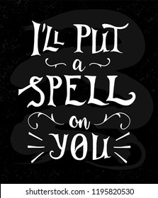 I'll put a spell on you phrase, hand drawn lettering, white letters on the black charcoal desk texture. Modern vector calligraphy art for banner, poster, greeting card, Halloween party invitation.