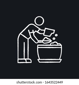 Putting soil into flower pot chalk white icon on black background. Planting preparation. Plant growing process. Indoor gardening. Domestic plants cultivation. Isolated vector chalkboard illustration