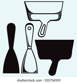 Putty knife. Construction tools. Isolated on blue background. Vector silhouettes