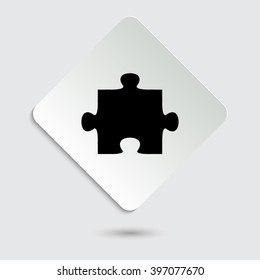 puzzle - black vector icon  on a paper button