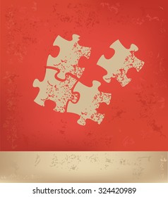 Puzzle design on red background, grunge vector
