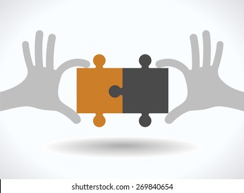  Rompecabezas en manos humanas. Concepto de trabajo en equipo.