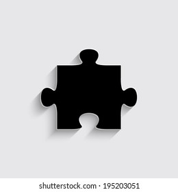 puzzle icon with shadow on a grey background