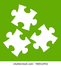 Puzzle icon white isolated on green background. Vector illustration