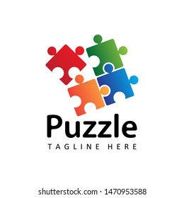 Puzzle logo template design vector in isolated background. Autism awareness concept logo for charitable organization, medical or wellness center.