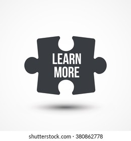 Puzzle piece. Concept image with LEARN MORE word. Flat icon