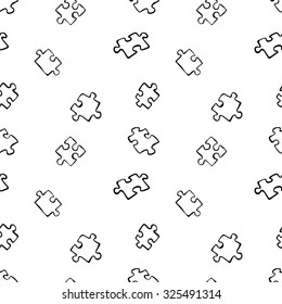 Puzzle. Pieces of puzzle. Black-and-white drawing. Vector seamless background.