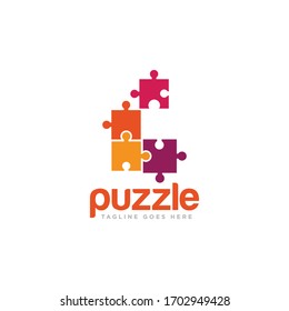 Vector de diseño de logotipos de piezas de rompecabezas