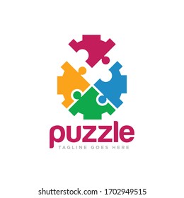 Vector de diseño de logotipos de piezas de rompecabezas