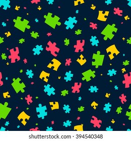 Puzzle pieces seamless pattern on dark background. It can be used for cards, party invitations, baby shower albums and scrap booking. Vector illustration.