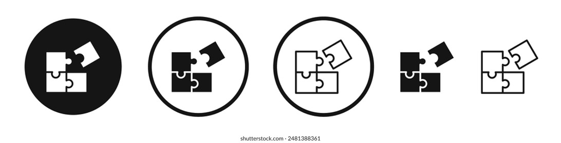 Puzzle pieces vector icon set in black and white color.