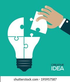 Puzzles in the form of a  light bulb. Human hand inserts the missing puzzle in his bulb. Concept of big idea. Complete The idea