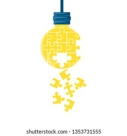 puzzles pieces in shape light bulb hanging