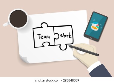 Puzzle(Team work word) drawn by hand on a white paper