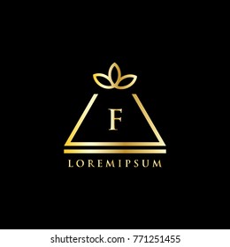 Pyramid Logo with flower letter f. luxury gold logo. Template vector illustration eps 10