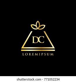 Pyramid Logo with flower. luxury logo. letter dc gold. Template vector illustration eps 10