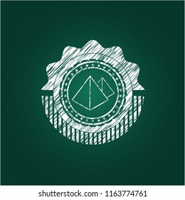 pyramids icon drawn on a blackboard