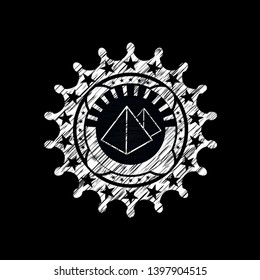 pyramids icon drawn on a blackboard
