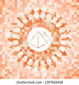 pyramids icon inside abstract orange mosaic emblem