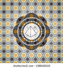 pyramids icon inside arabesque style emblem. arabic decoration.