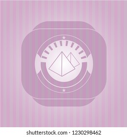 pyramids icon inside badge with pink background