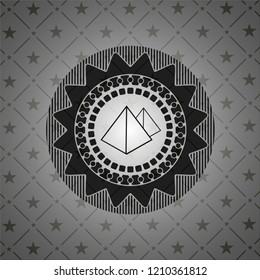 pyramids icon inside black badge