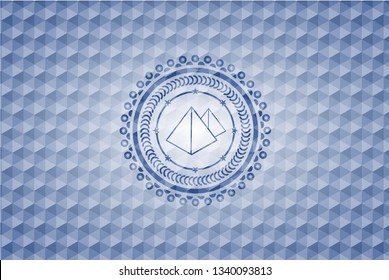 pyramids icon inside blue badge with geometric background.