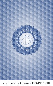 pyramids icon inside blue badge with geometric pattern background.