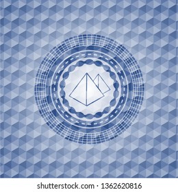 pyramids icon inside blue hexagon badge.
