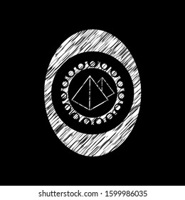 pyramids icon inside chalk emblem