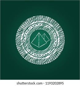 pyramids icon inside chalkboard emblem