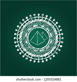 pyramids icon inside chalkboard emblem