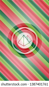 pyramids icon inside christmas colors style emblem.