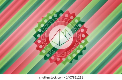 pyramids icon inside christmas colors style emblem.