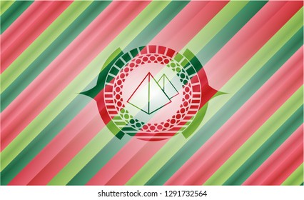 pyramids icon inside christmas emblem.
