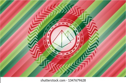 pyramids icon inside christmas style emblem.