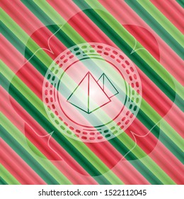 pyramids icon inside christmas style badge..