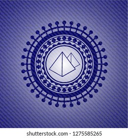 pyramids icon inside emblem with denim high quality background