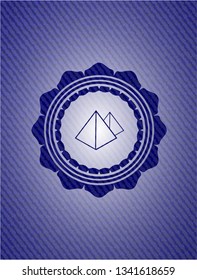 pyramids icon inside emblem with denim high quality background