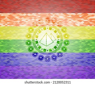 pyramids icon inside emblem on mosaic background with the colors of the LGBT flag. 