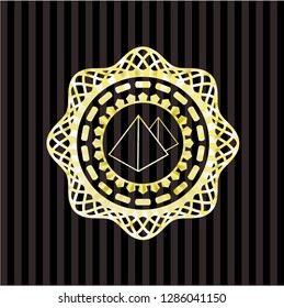 pyramids icon inside gold badge or emblem