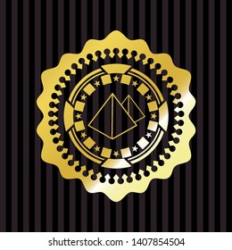 pyramids icon inside gold emblem