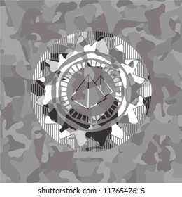 pyramids icon inside grey camo emblem