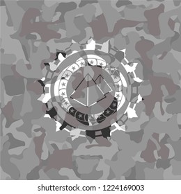 pyramids icon inside grey camo texture