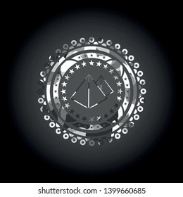 pyramids icon inside grey camouflaged emblem