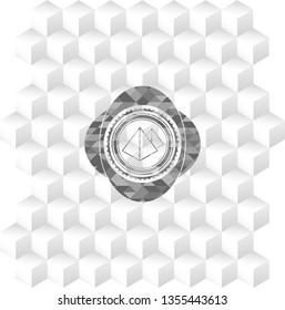 pyramids icon inside grey emblem with geometric cube white background