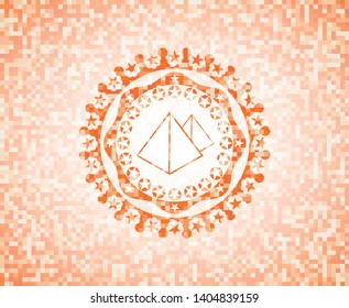 pyramids icon inside orange mosaic emblem with background